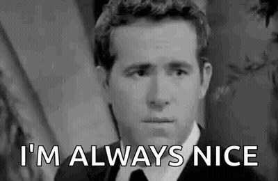 Man In Suit Making Funny Face Saying Im Always Nice GIF