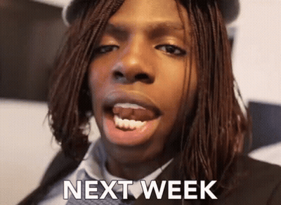 Man In Suit Making Funny Face Saying Next Week GIF