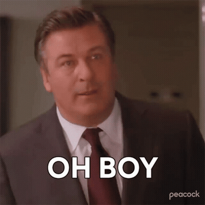 Man In Suit Making Funny Face Saying Oh Boy GIF