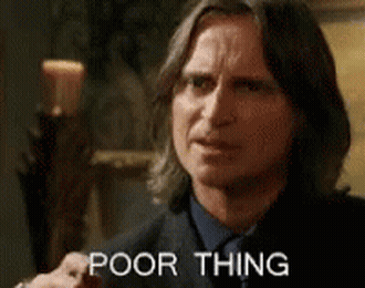Man In Suit Making Funny Face Saying Poor Thing GIF