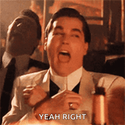 Man In Suit Making Funny Face Saying Yeah Right GIF