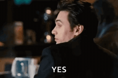 Man In Suit Making Funny Face Saying Yes GIF