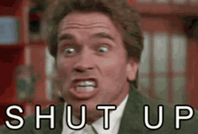 Man In Suit Making Funny Face Shut Up GIF
