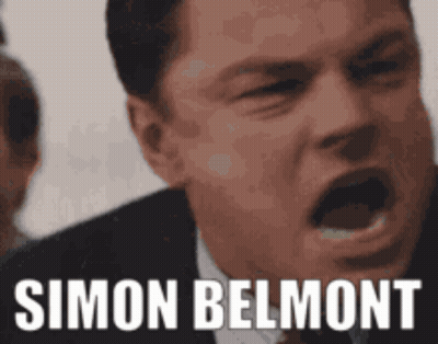 Man In Suit Making Funny Face Simon Belmont GIF