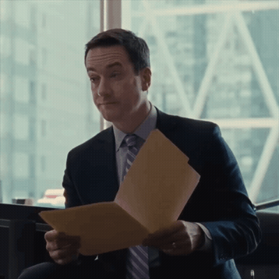 Man In Suit Making Funny Face GIF
