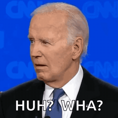 Man In Suit Making Funny Face GIF