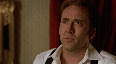 Man In Suit Making Funny Face Talking To Another Man GIF