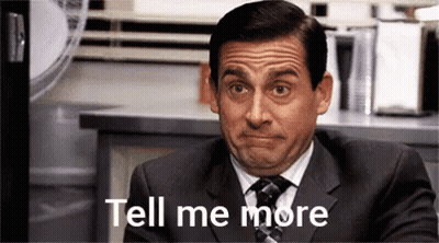 Man In Suit Making Funny Face Tell Me More GIF