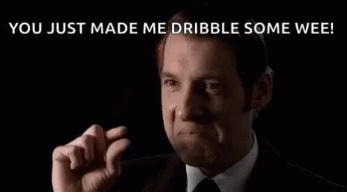 Man In Suit Making Funny Face GIF