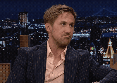 Man In Suit Making Funny Face GIF