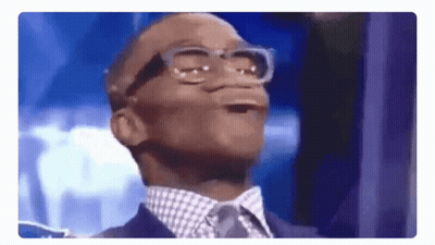 Man In Suit Making Funny Face With Glasses GIF