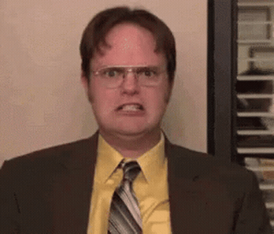 Man In Suit Making Funny Face With Glasses GIF
