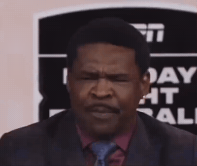 Man In Suit Making Funny Face With Hands GIF