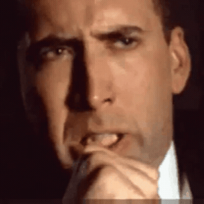 Man In Suit Making Funny Face With Mouth Open GIF