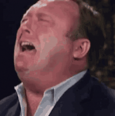Man In Suit Making Funny Face With Mouth Open GIF