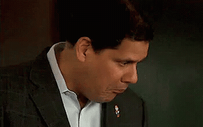 Man In Suit Making Funny Face With Mouth Open GIF