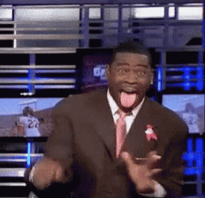 Man In Suit Making Funny Face With Tongue Out GIF