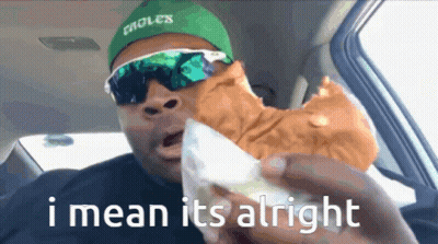 Man In Suit Making Funny Face GIF