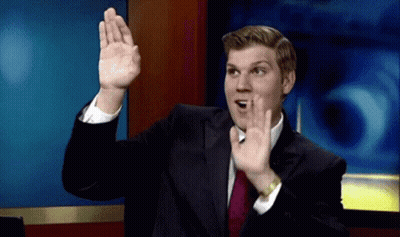 Man In Suit Making Gesture GIF