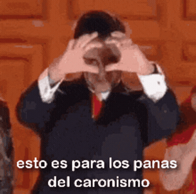 Man In Suit Making Heart Shape GIF