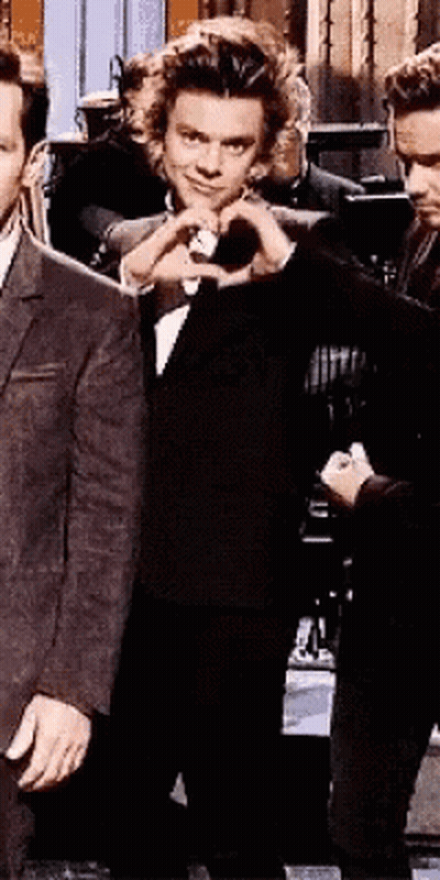 Man In Suit Making Heart Shape With Hand GIF