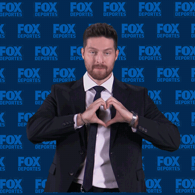 Man In Suit Making Heart Shape With Hands Fox Deportes Background GIF
