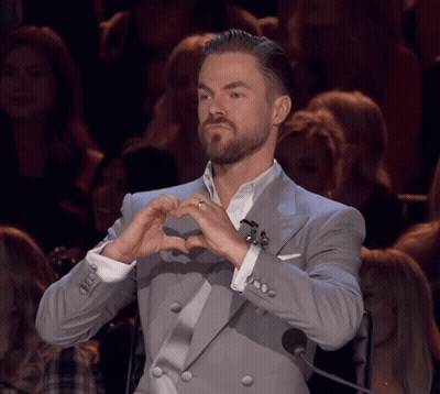 Man In Suit Making Heart With Hands GIF