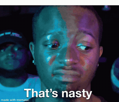 Man In Suit Making Nasty Face GIF