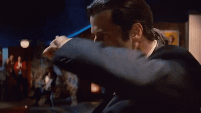 Man In Suit Making Peace Sign GIF
