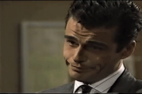 Man In Suit Making Silly Face GIF