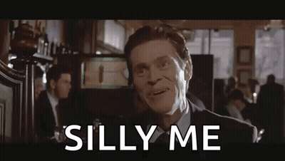 Man In Suit Making Silly Face GIF