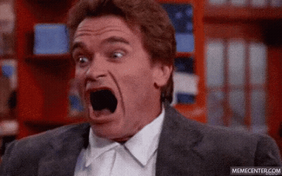 Man In Suit Making Surprised Face GIF