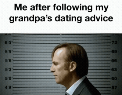 Man In Suit Mugshot After Following Grandpa's Dating Advice GIF