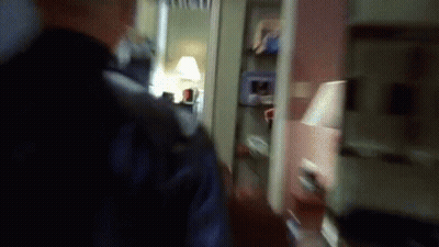 Man In Suit Next To Basketball Player GIF