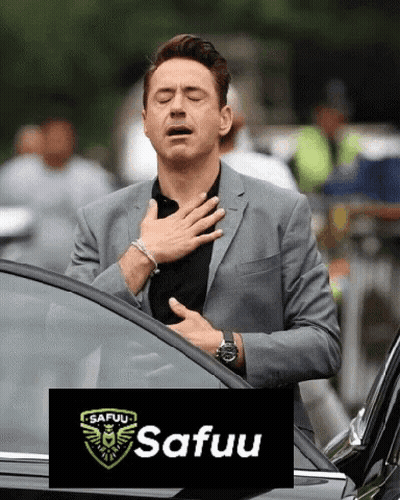 Man In Suit Next To Car Hand On Chest Safuu Logo GIF