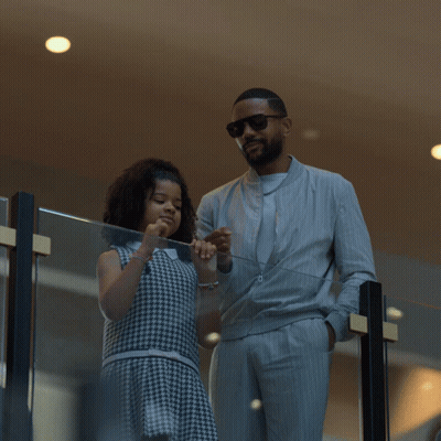 Man In Suit Next To Little Girl In Dress GIF