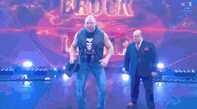 Man In Suit Next To Man In Black Shirt Saying Live GIF
