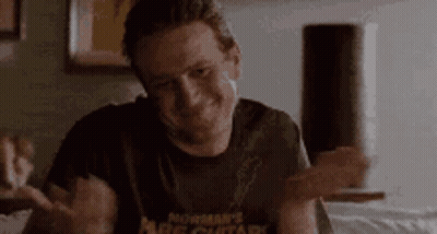 Man In Suit Next To Man In White Shirt GIF