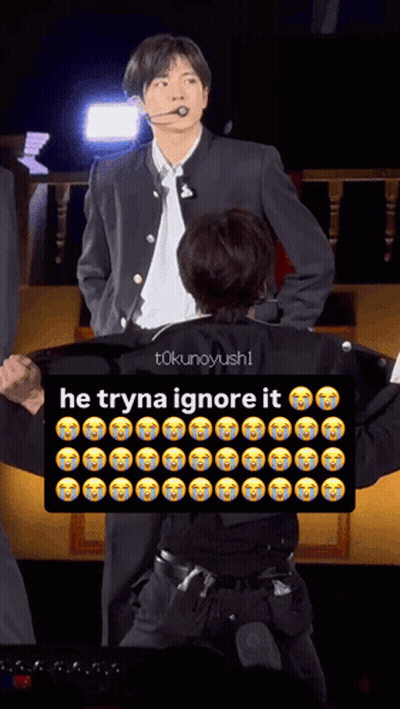 Man In Suit Next To Man With Sign Saying He Tryna Ignore It GIF