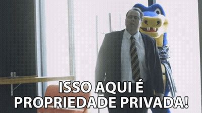 Man In Suit Next To Mascot Says Isso Aqui E Propriedade Privada GIF