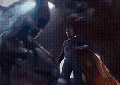 Man In Suit Next To Woman In Red Dress GIF