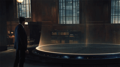 Man In Suit Next To Woman In Red Dress GIF
