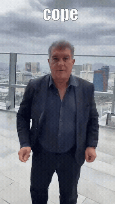 Man In Suit On Balcony Saying Cope GIF