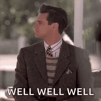 Man In Suit On Bench Saying Well Well Well GIF