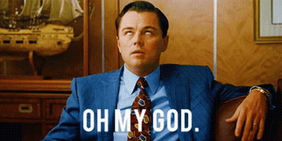 Man In Suit On Couch Saying Oh My God GIF