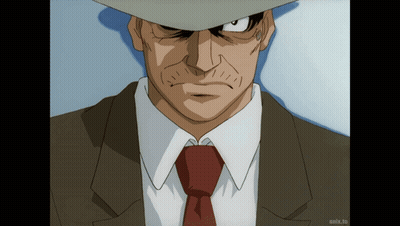 Man In Suit On Screen Saying Anix.to GIF