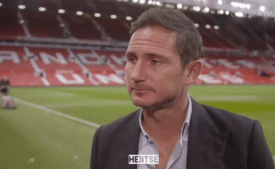 Man In Suit On Soccer Field Saying Heitse GIF
