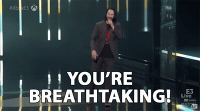 Man In Suit On Stage With You're Breathtaking GIF