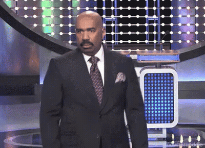 Man In Suit On Stage GIF