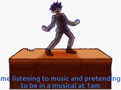 Man In Suit On Table Me Listening To Music GIF